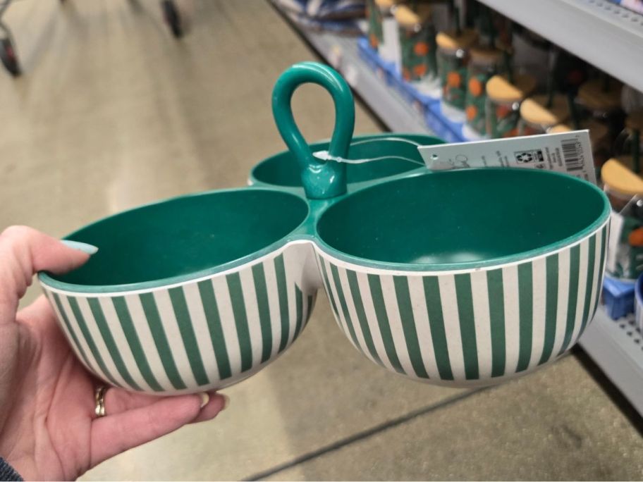 Hand holding a Mainstays by Becky G. & Alejandra Bamboo Melamine Triple Condiment Server