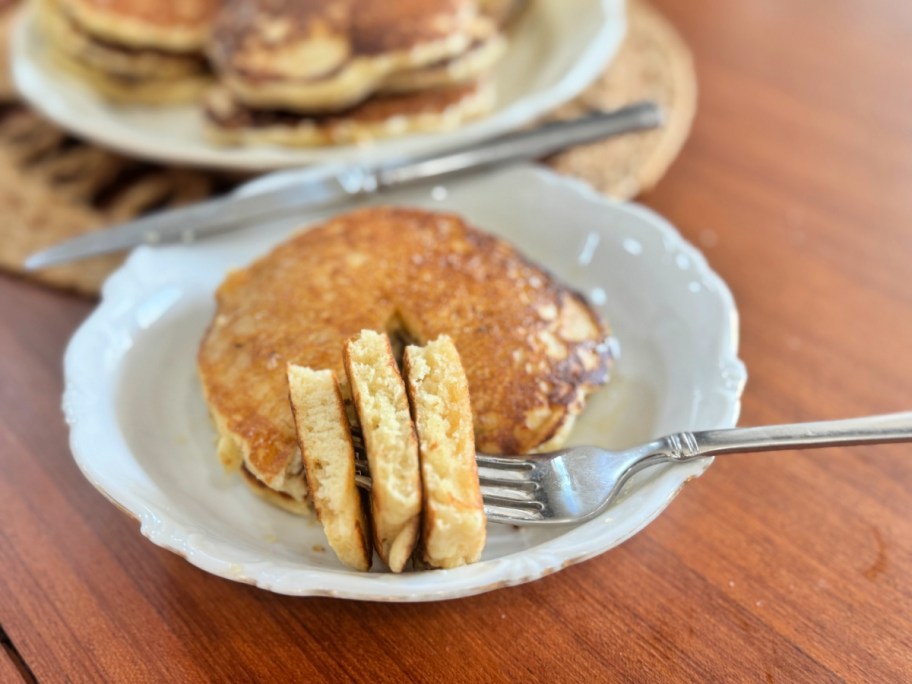 airy sourdough pancakes on a plate