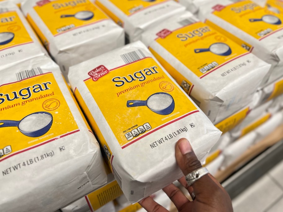choosing a bag of sugar
