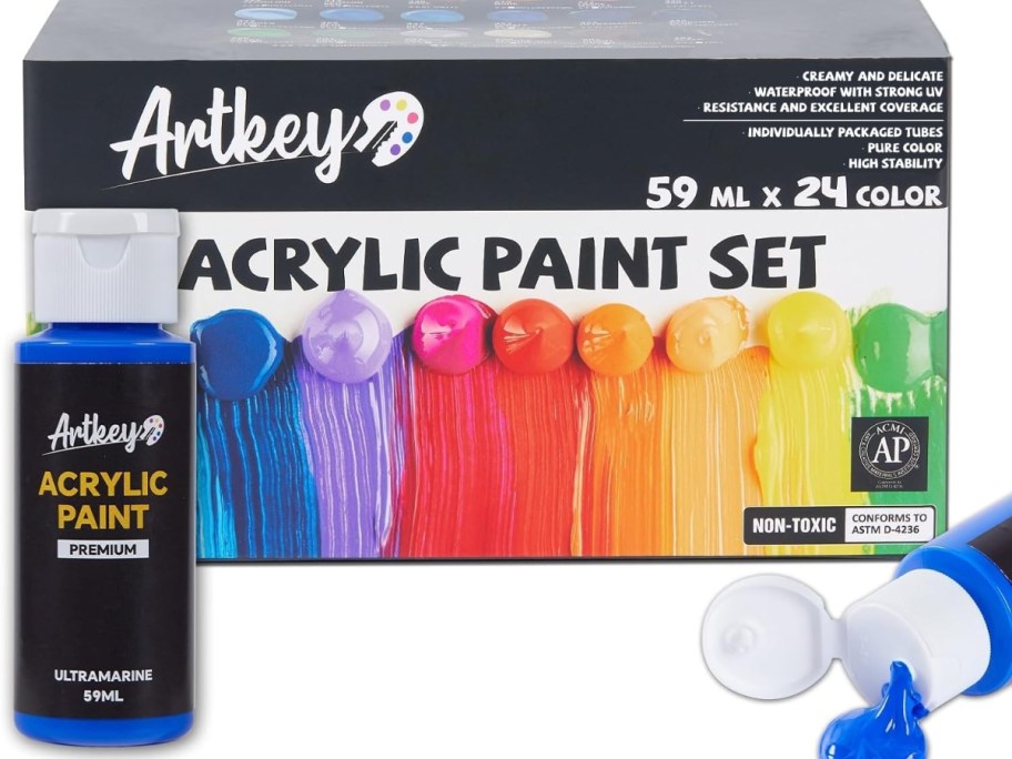 a box with an Acrylic Paint Set with 2 bottles of paint in front of it