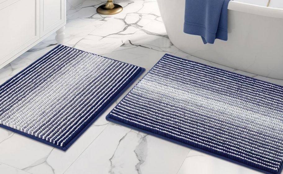 two navy blue gradient bath mats