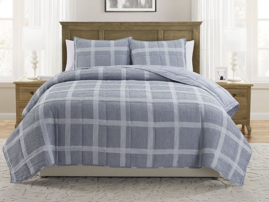 blue My Texas House Waldin 3-Piece Windowpane Plaid Box Quilt Set on bed in bedroom