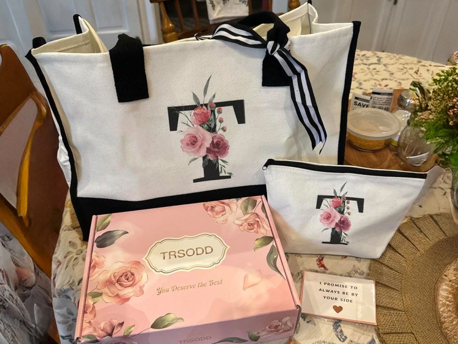 tote bag set on a table with gift box