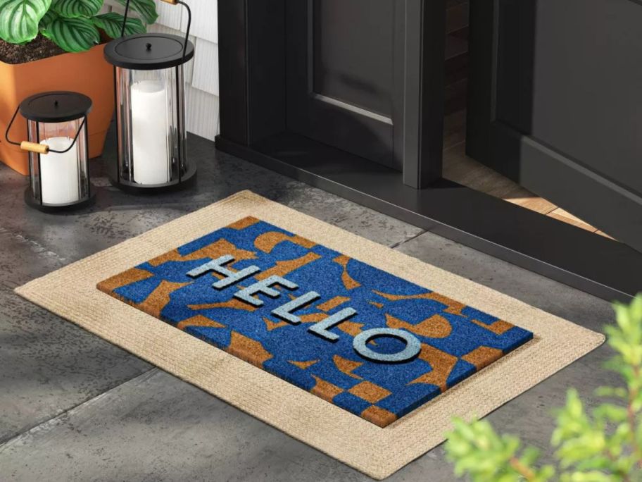 beige and blue Room Essentials Hello Geo Doormat at doorstep
