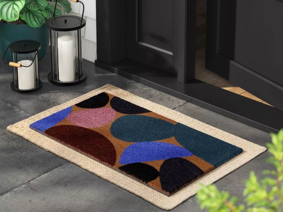 beige, blue, green, and pink Room Essentials Geometric Blob Doormat at doorstep