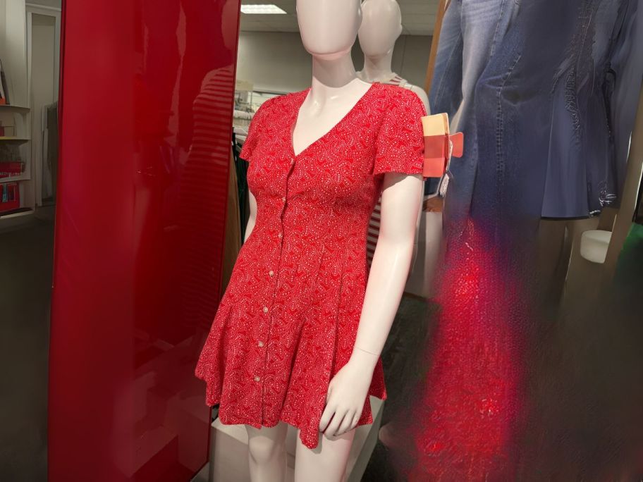 red paisley Universal Thread Women's Button-Front Mini Dress on mannequin in store