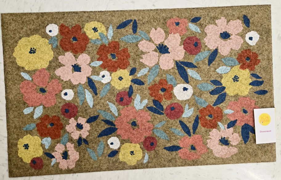 coir doormat with multi colored flowers
