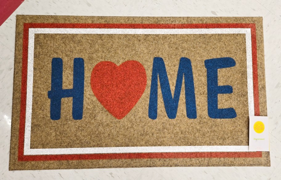 coir doormat that says home 
