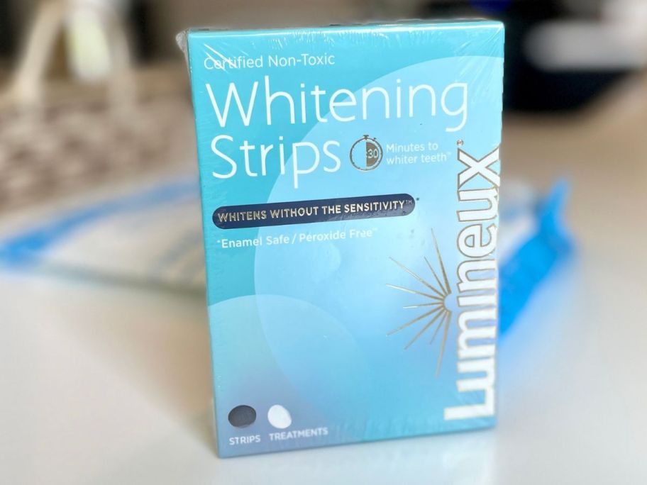 Lumineux Teeth Whitening Strips box on counter