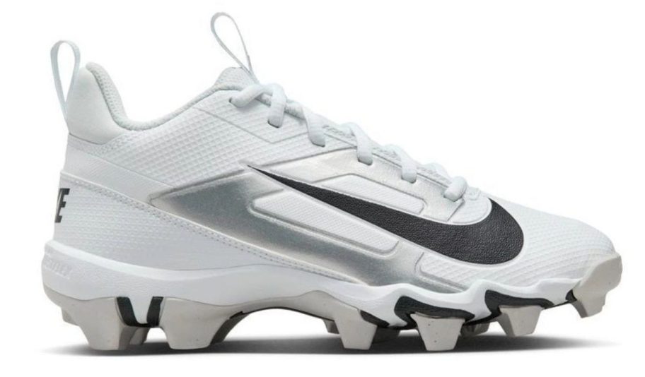 black and white Nike Big Kids Alpha Menace 4 Shark Molded Football Cleat stock image
