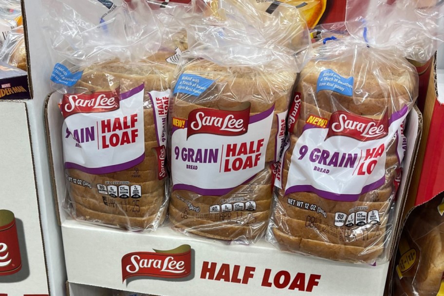 half bread loaves on shelf in store