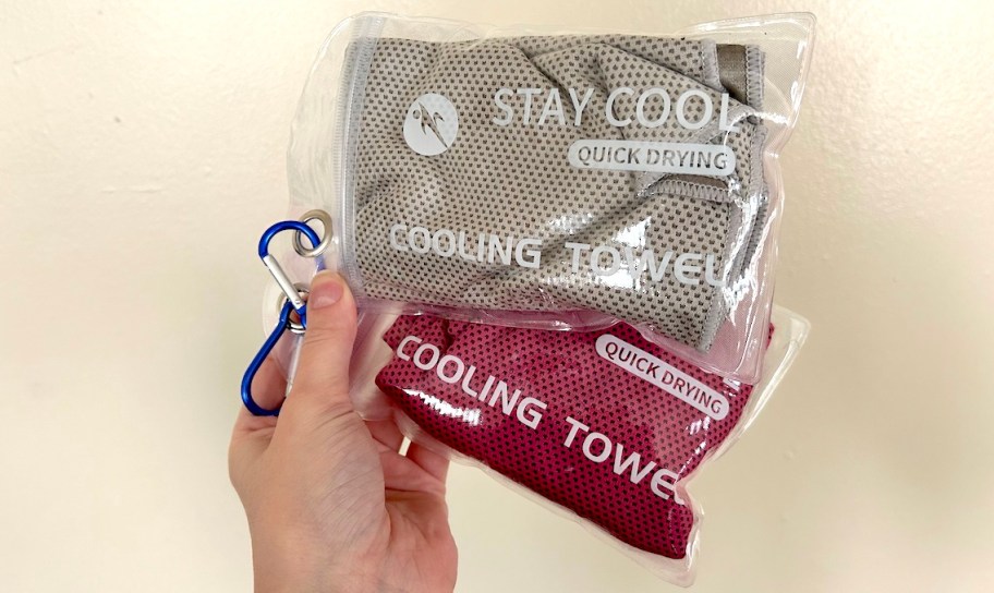 hand holding stay cool cooling towels in clear bag