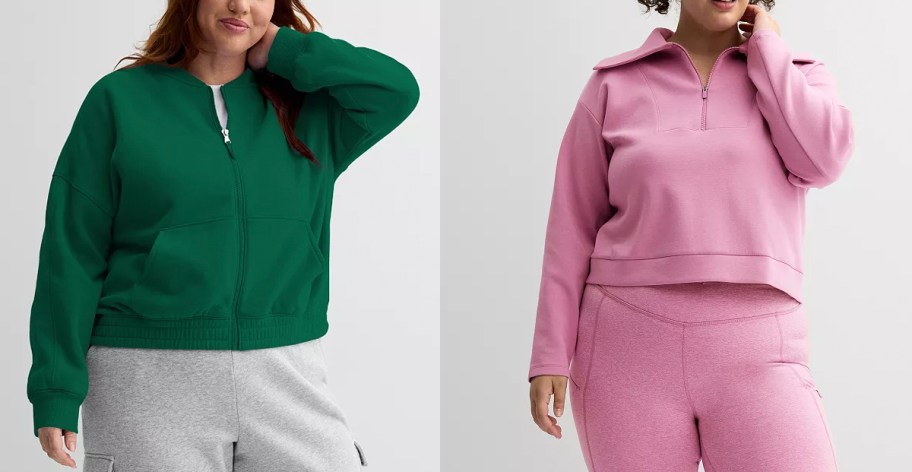 two women wearing green and pink sweatshirts