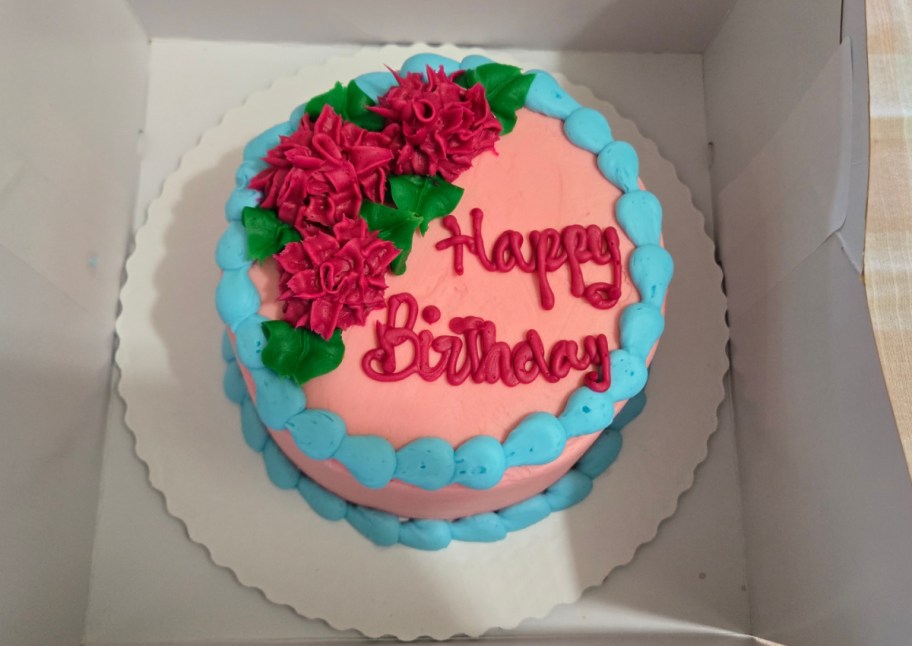 pink and blue happy birthday cake in box