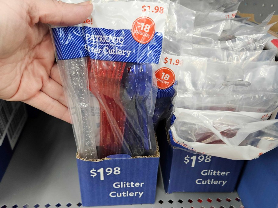 hand reaching for patriotic cutlery 