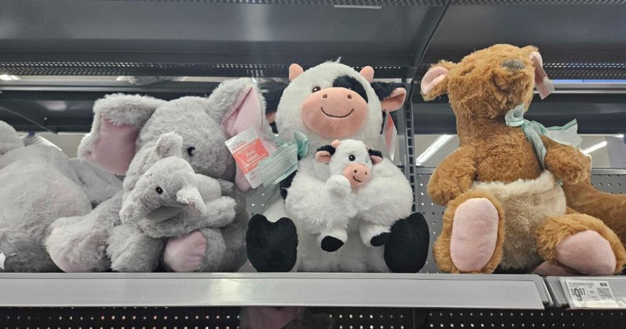 an elephant, cow, and kangaroo Way To Celebrate Mom & Me Plush on shelf in store