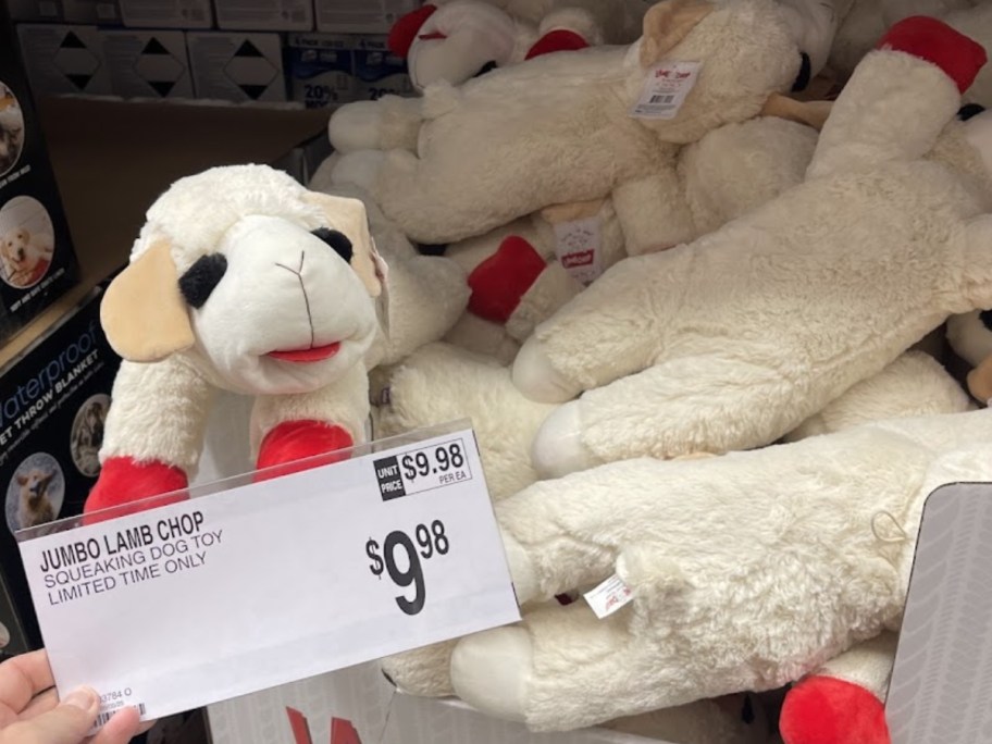 large plush Lamp Chop dog toys in a bin at Sam's Club