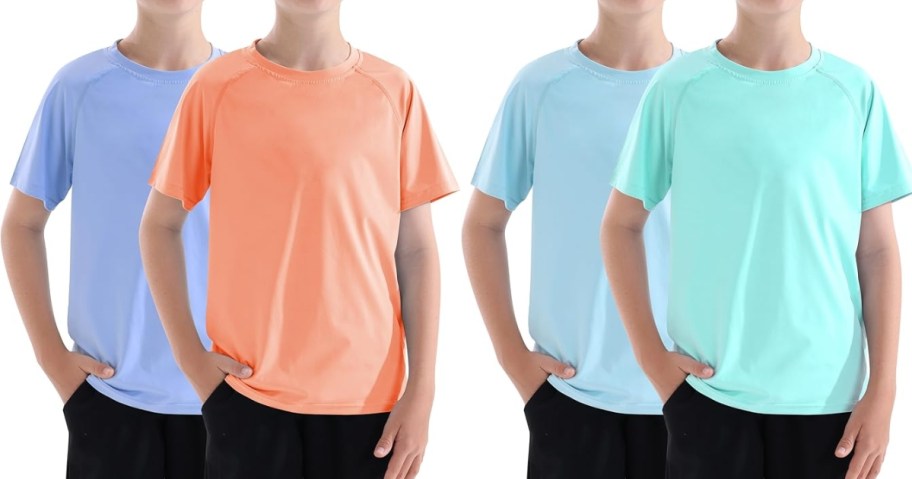 little boys wearing different colors of rash guard shirts and shorts