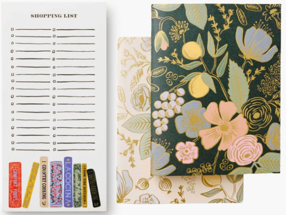 a note pad with a shopping list and a 2 journals with flowers on them