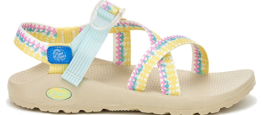 a women's Chaco sandal with colorful straps and an off white sole