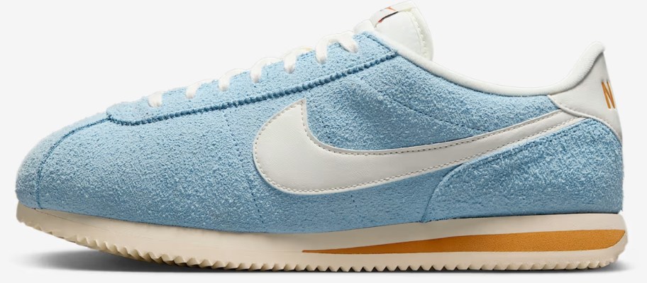 a men's Nike Cortez style shoe in blue and white
