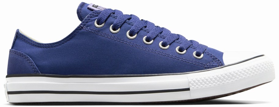 blue low top converse sneaker