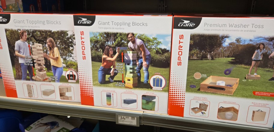 Three different crane outdoor play items including giant blocks and water play