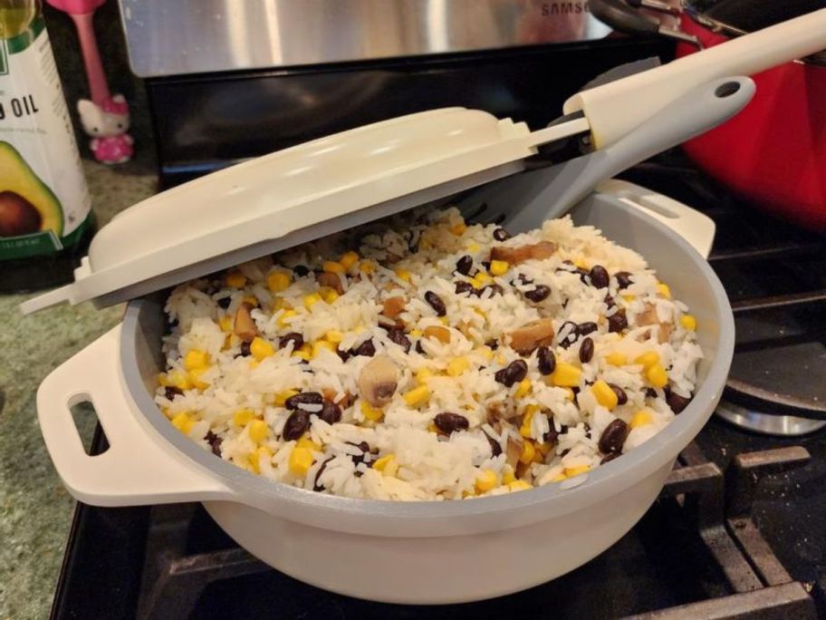 A dash smartstore pot filled with a chicken and rice dish