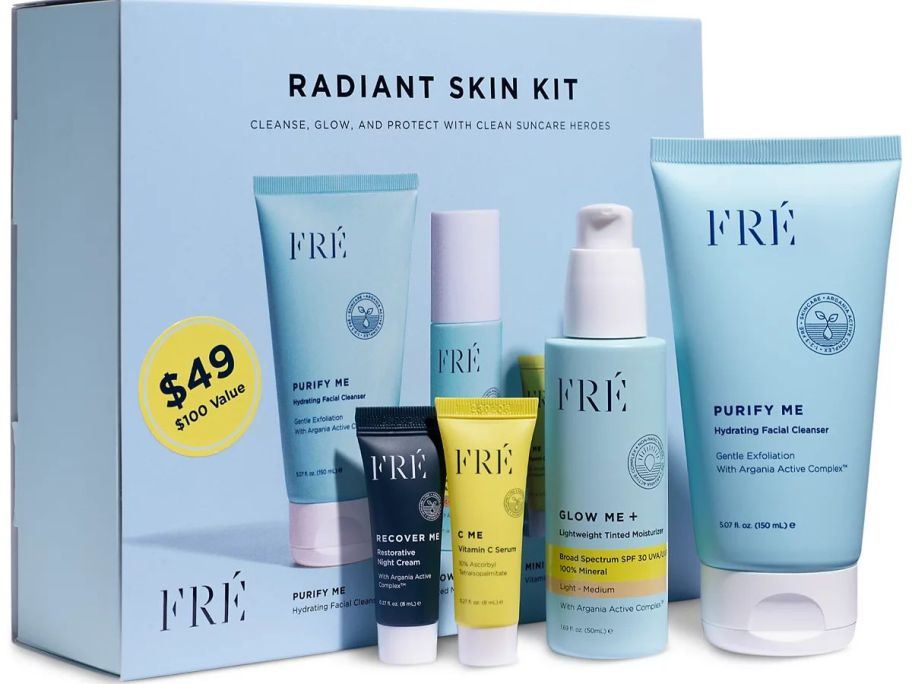 A blue box with skincare bottles and tubes in front of it 