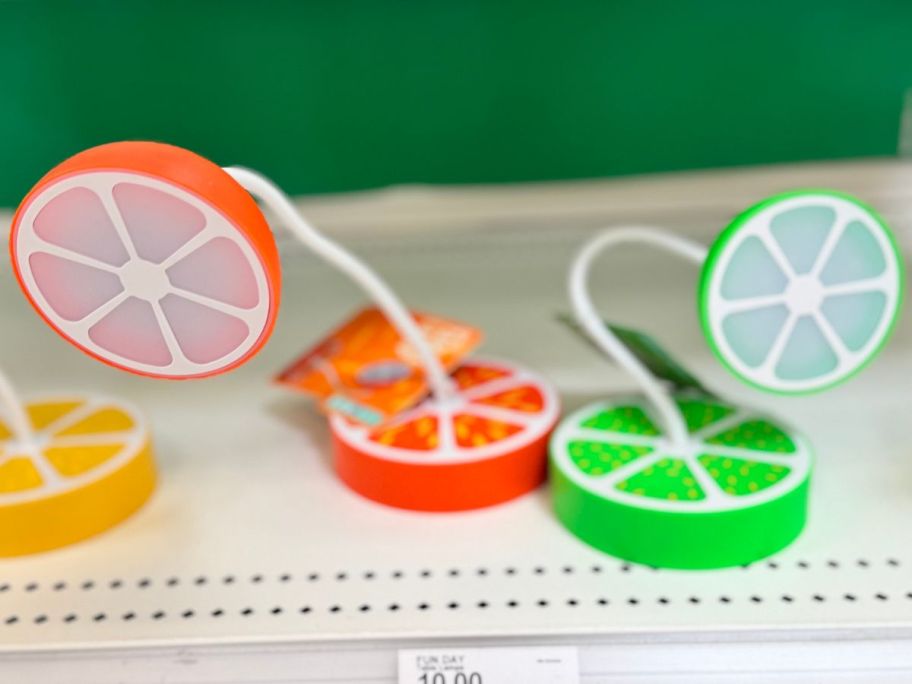 Citrus shaped lamps on an end cap at Target