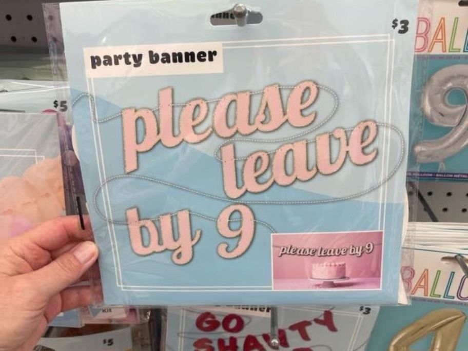 A party banner with the words: Please Leave by Nine