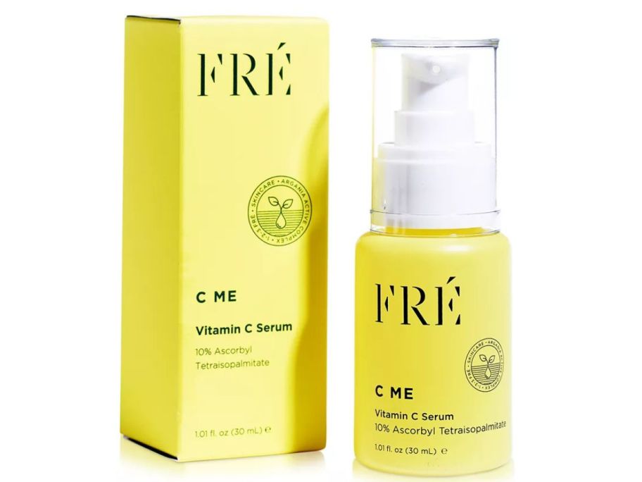 a yellow bottle of face cream next to a yellow box 