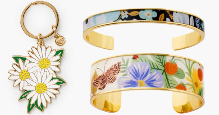 a daisy enamel keychain, a skinny and a wider floral cuff bracelets
