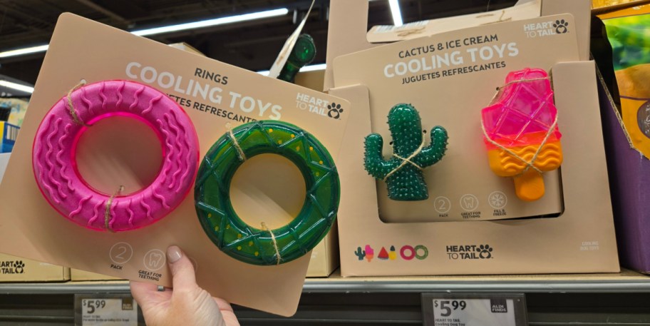 hand holding one set of cooling toys 2 pack while another is shown on the ALDI's store display