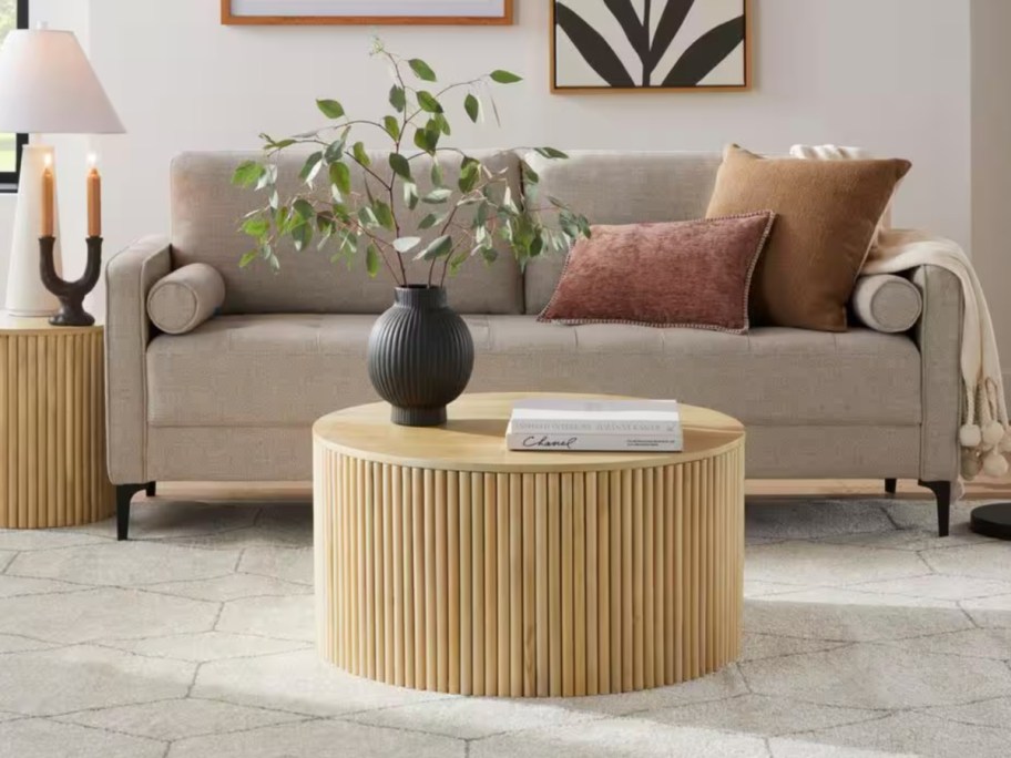 circular wooden coffee table inside living room