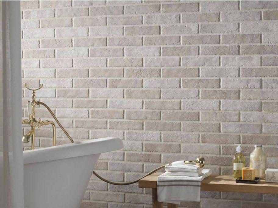 A wall with MSI Capella Ivory Brick Matte Porcelain Tile 