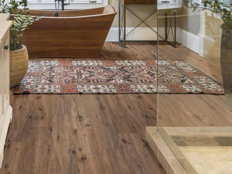 Bathroom with A&A Surfaces Forrest Brown Waterproof Loose Lay Luxury Vinyl Plank Flooring