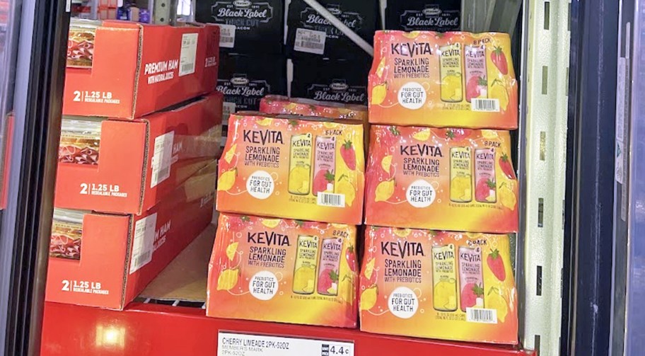 stacked cases of KeVita Sparkling Lemonade Refreshers in refrigerator case
