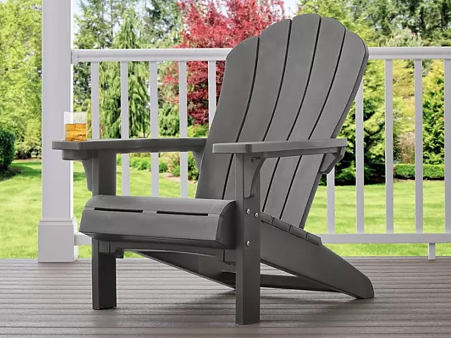 Keter Everest Adirondack Chair w: Cupholder on a porch outside