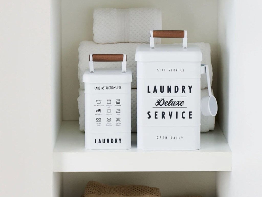 Two piece metal laundry storage set on shelf