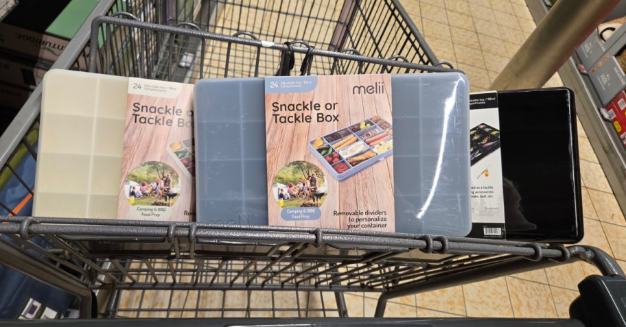 Three different color Melii Extra Large Snackle Boxes inside of an ALDIs shopping cart