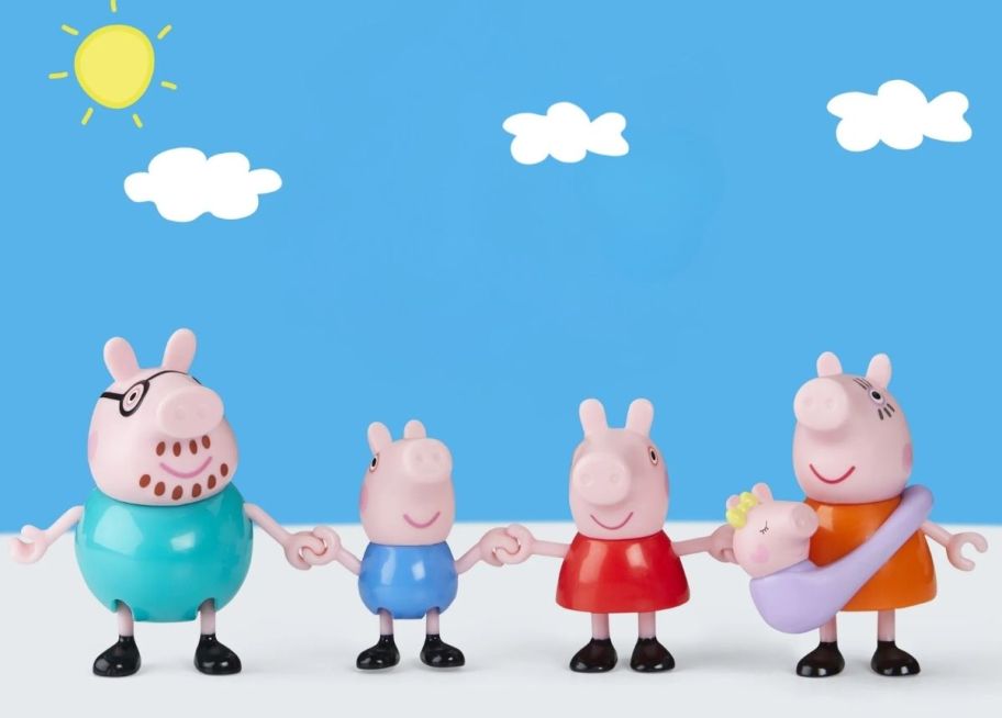 4 peppa pig character figures with mom figure holding new baby evie