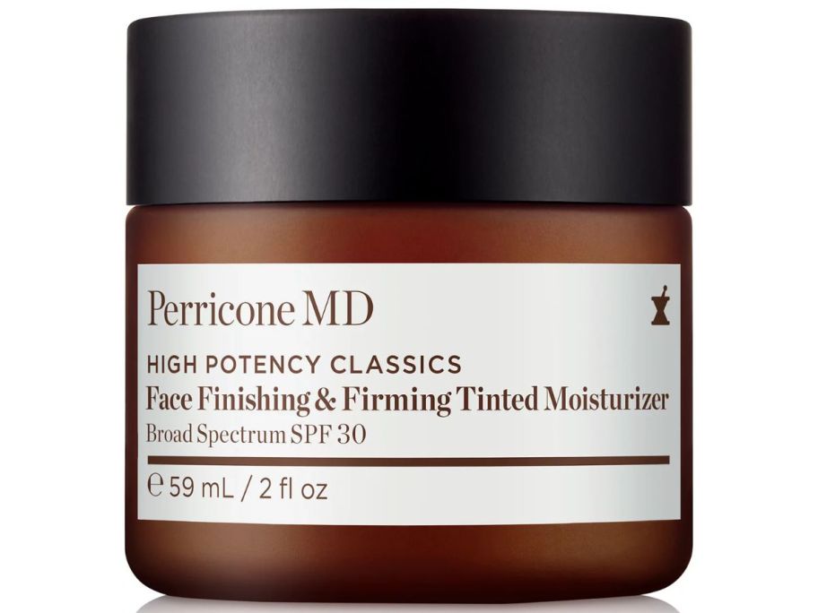 A brown and black canister of tinted moisturizer