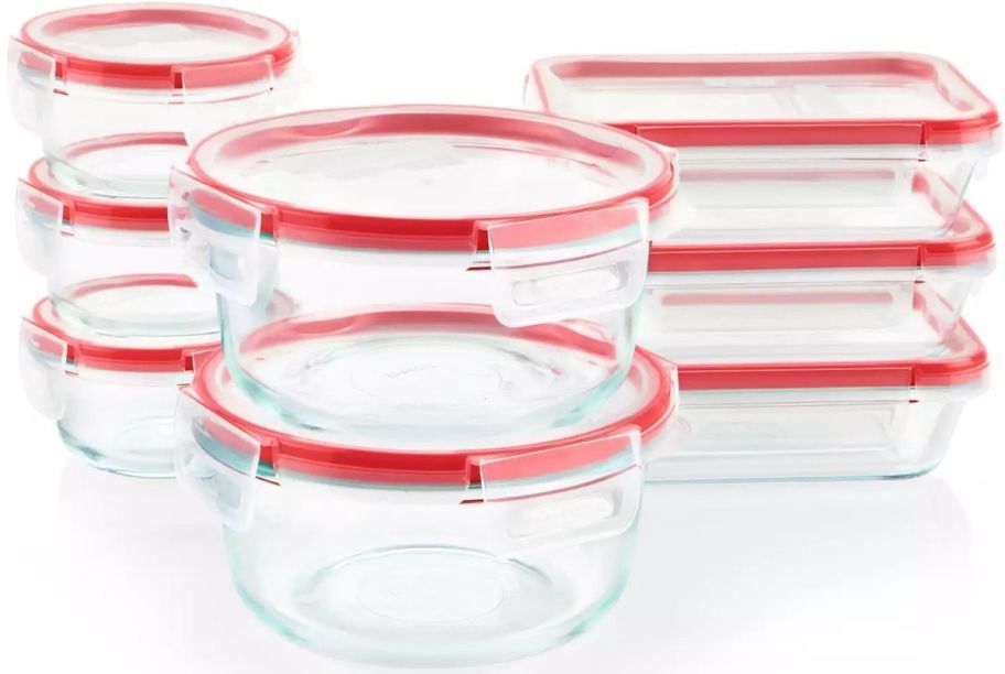 a stack of 5 round and rectangular glass food storage bowls with clear locking plastic lids and red gaskets
