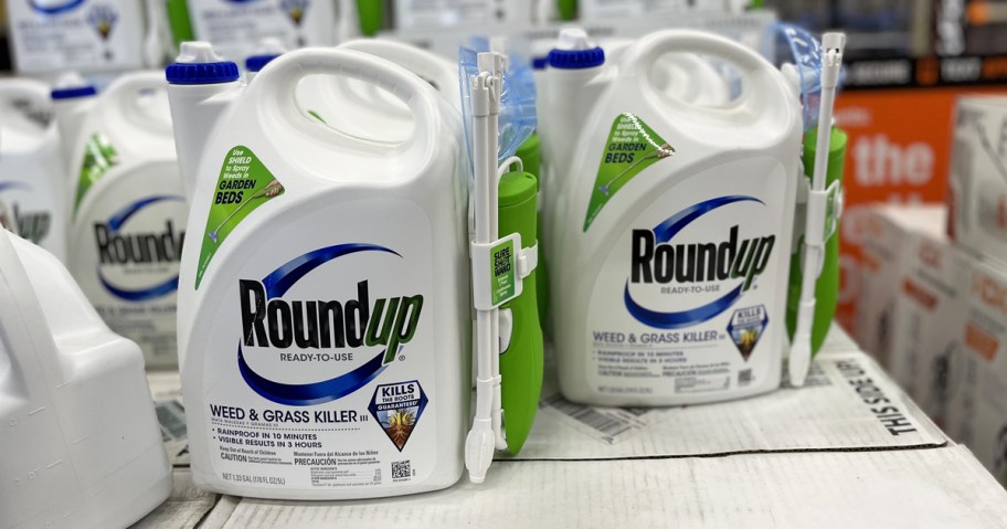 white and blue bottles of Roundup