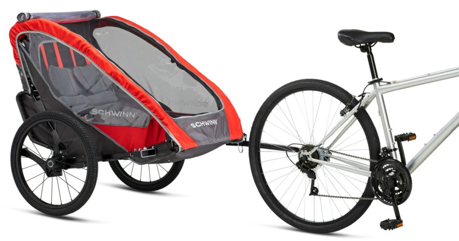 red Schwinn Bike Trailer attached to a bike