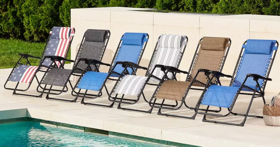 Sonoma Anti-Gravity Patio Lounge Chairs in a row near a pool
