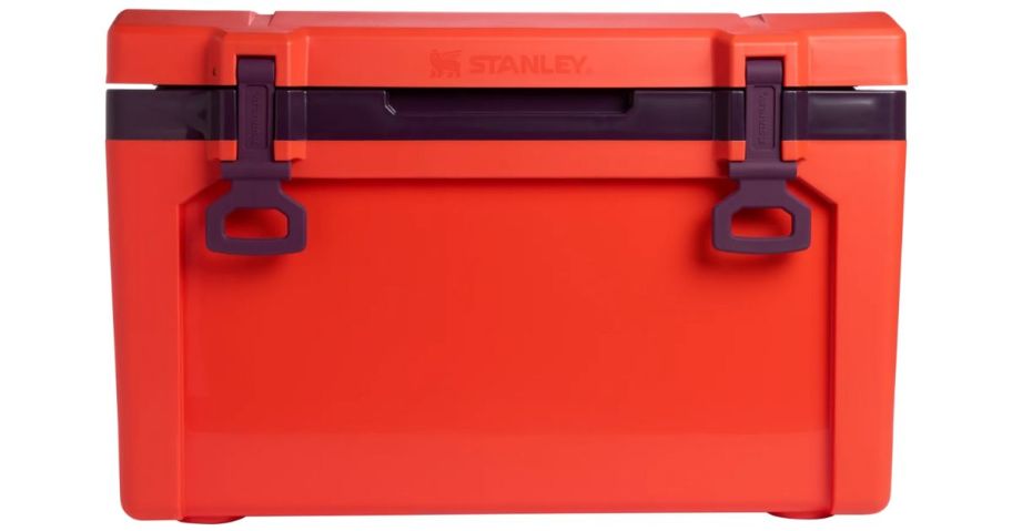 An orange Stanley cooler
