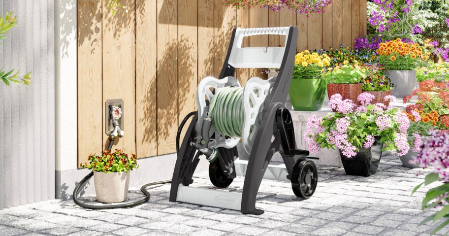 hose reel cart near planters