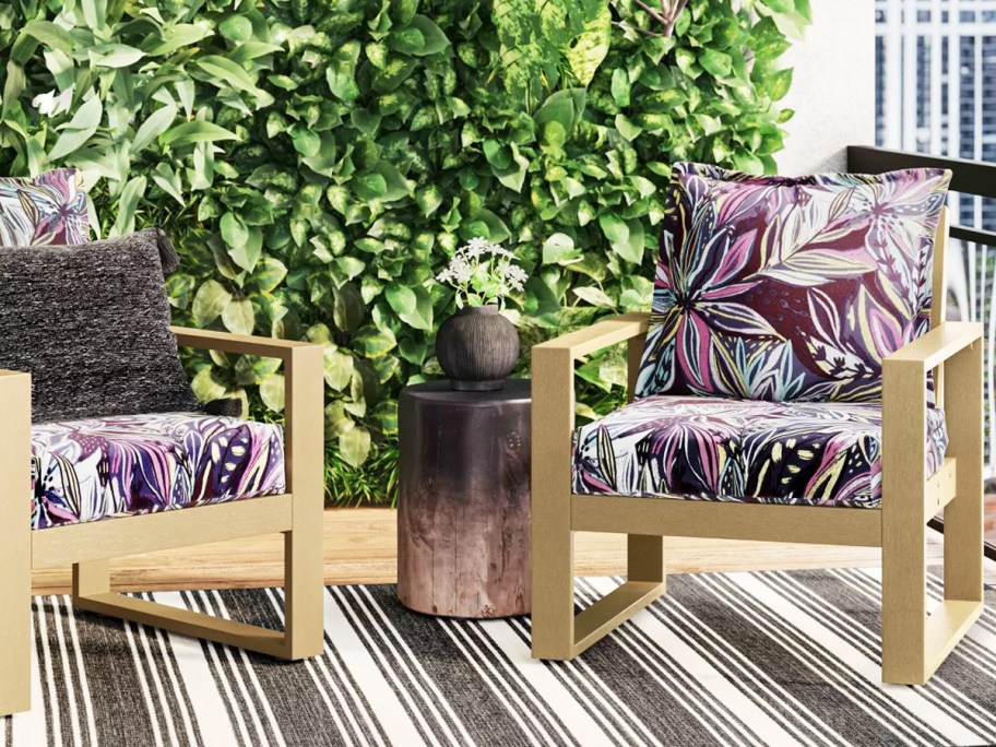 wood patio chairs with purple floral print cushions